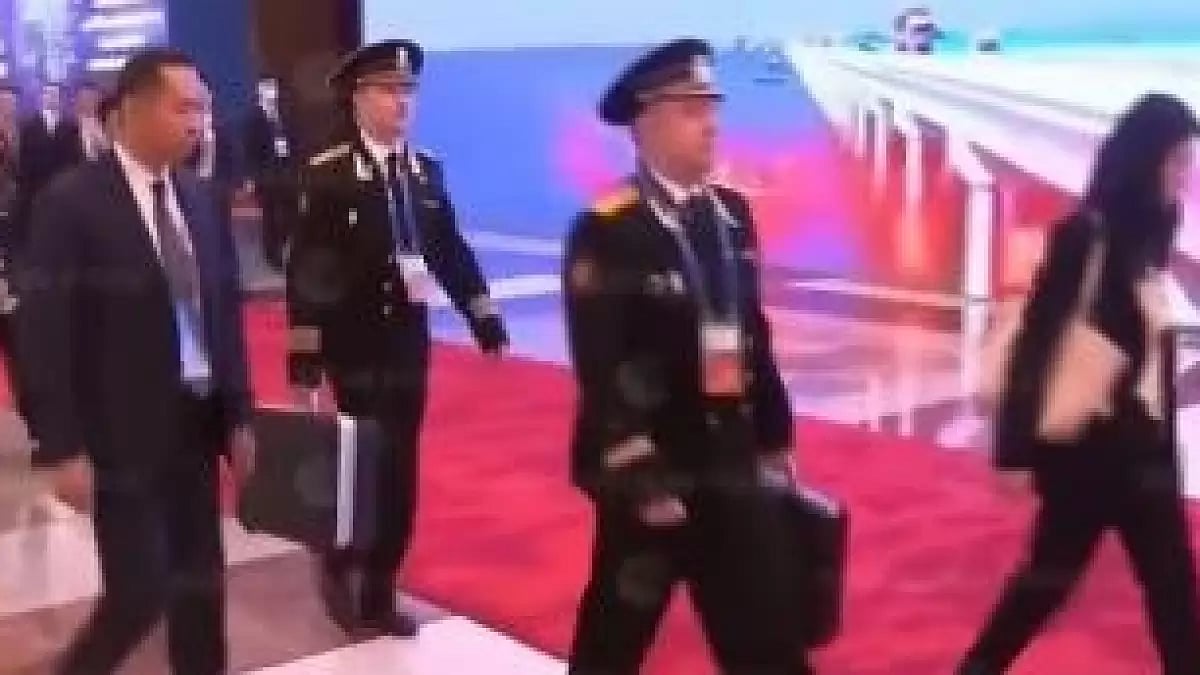 Russian naval officers with nuclear briefcase in China