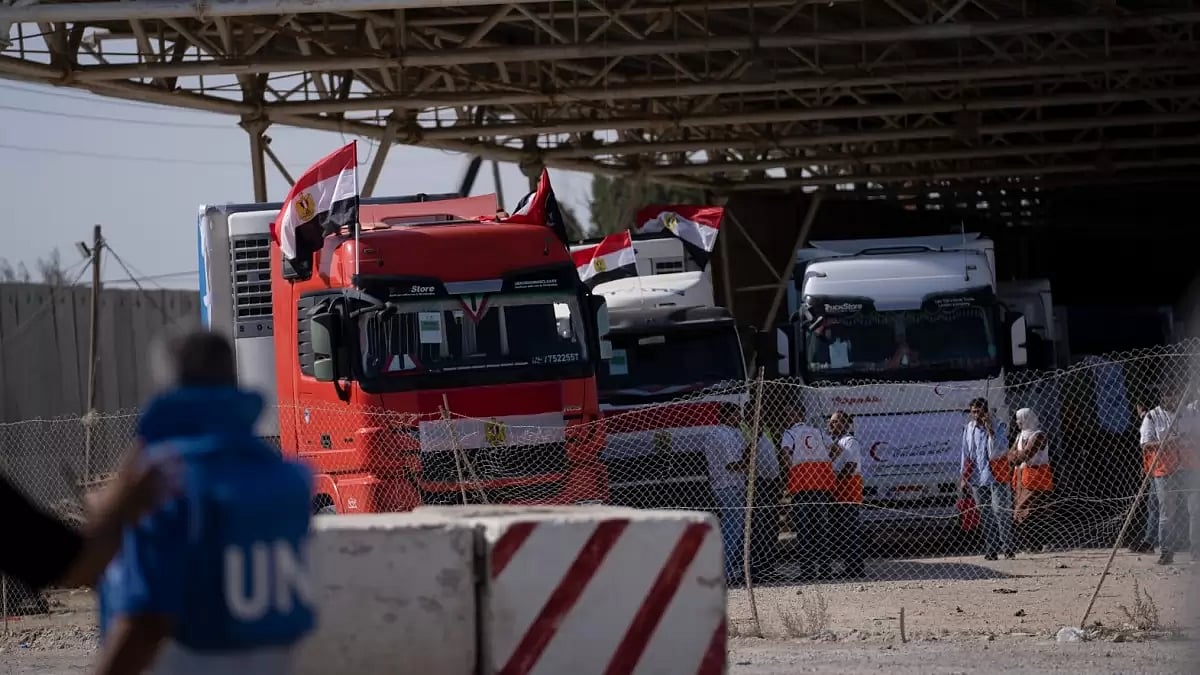 Trucks with humanitarian aid at the Rafah border crossing at the Egypt-Gaza Strip border. 