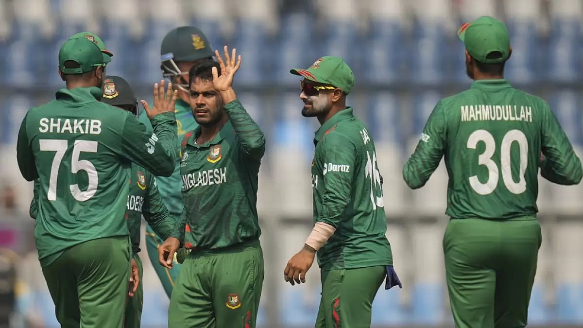 Bangladesh celebrate Rassie van der Dussens wicket in Mumbai.