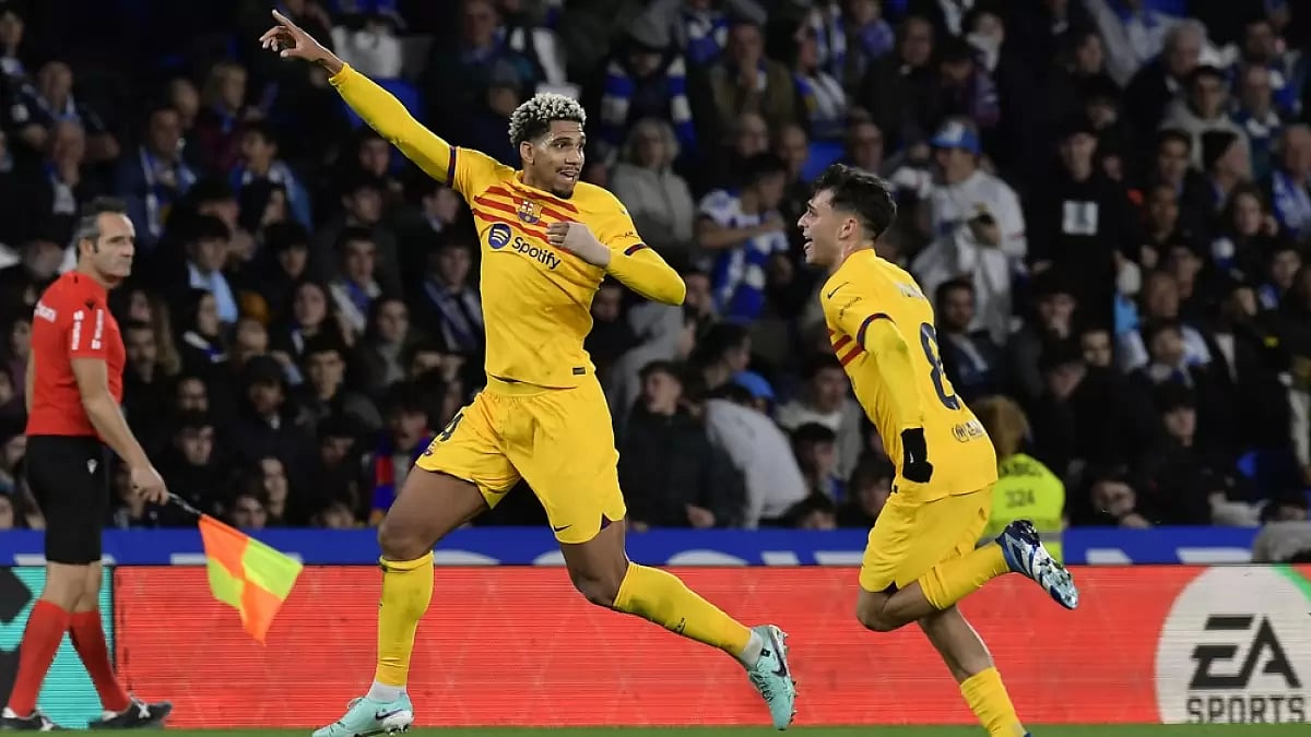 Barcelonas Ronald Araujo celebrates after scoring.