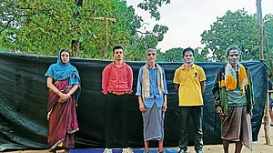 Free At Last: Shankar Podiyami (in red shirt) with his family after being released by the Maoists