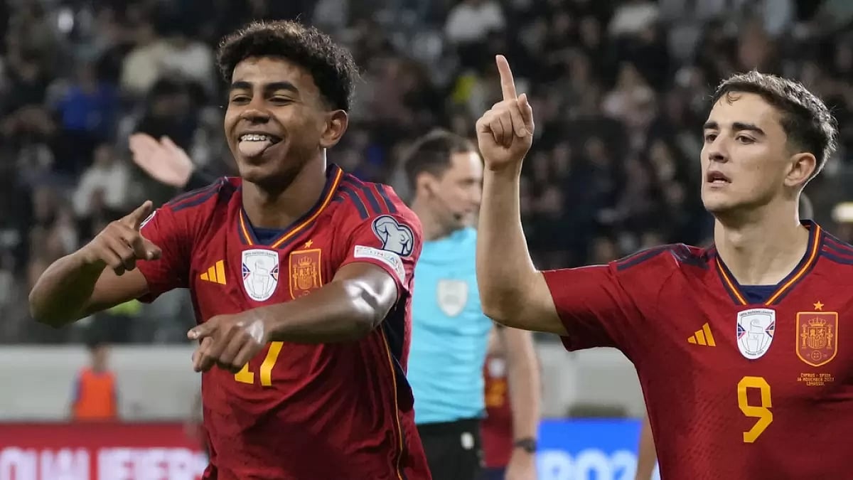 Lamine Yamal (L) celebrates his goal in the Spain vs Cyprus match at the 2024 Euro Qualifiers. 