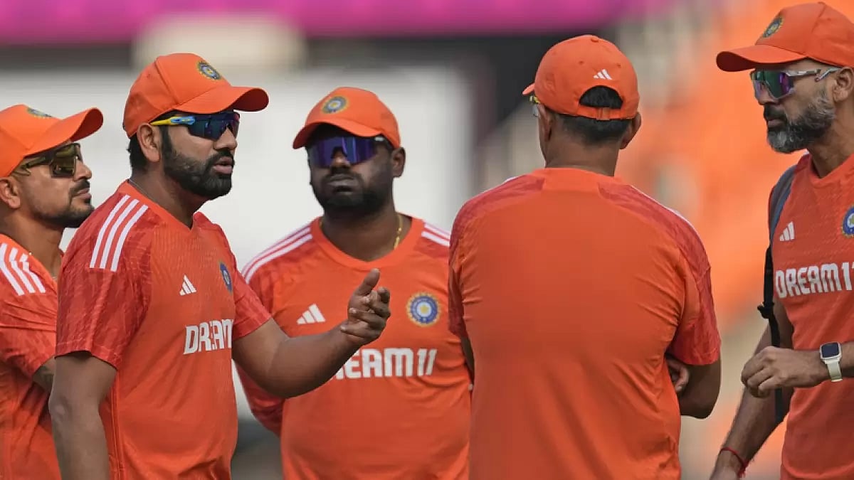 Indian cricket team with coach and supporting staff during a practice session ahead of the ICC World Cup final in Ahmedabad.