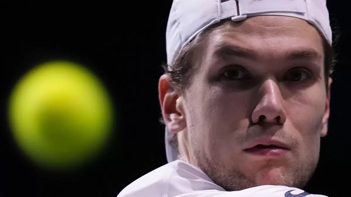 Finland's Otto Virtanen during a shot in the Davis Cup quarter-final tennis match against Finland