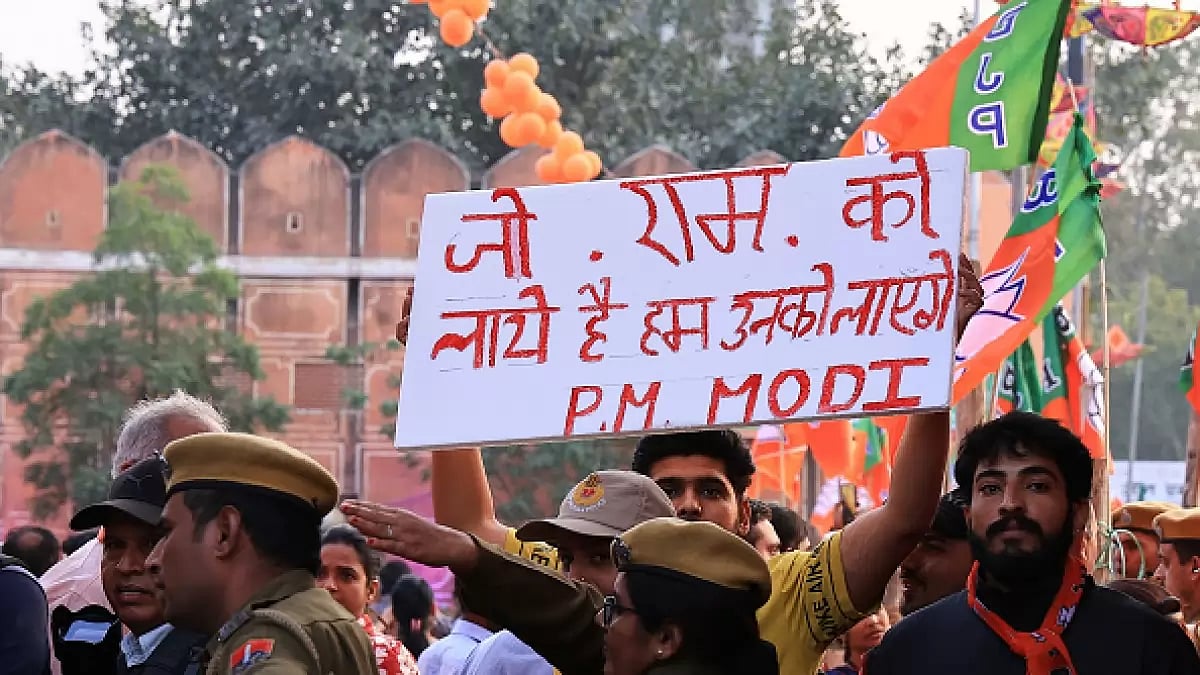 A BJP supporter is participating in Modi's road show ahead of the Rajasthan polls