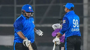 Karachi Whites wicket-keeper batter Azam Khan (L) during a match in National T20 Championships