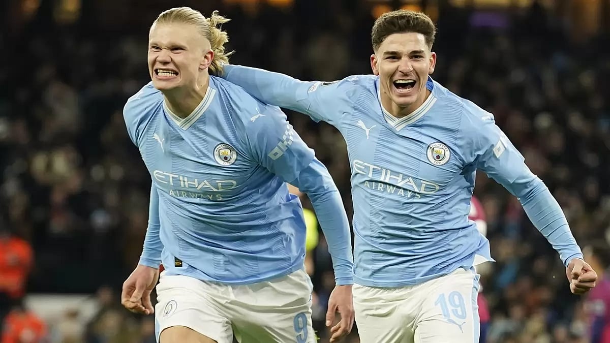 Manchester City's Julian Alvarez, right, and Erling Haaland in action at the UEFA Champions League 2023-24 season.