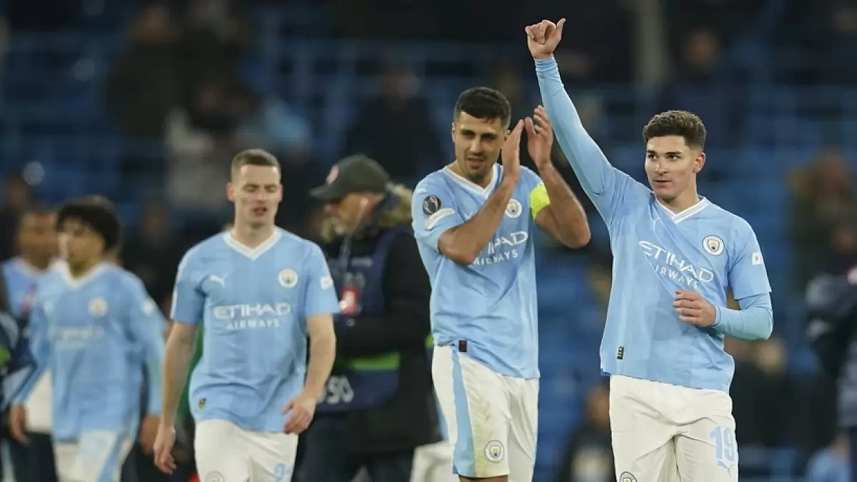 Manchester City players celebrate victory against RB Leipzig during the Champions League match - null