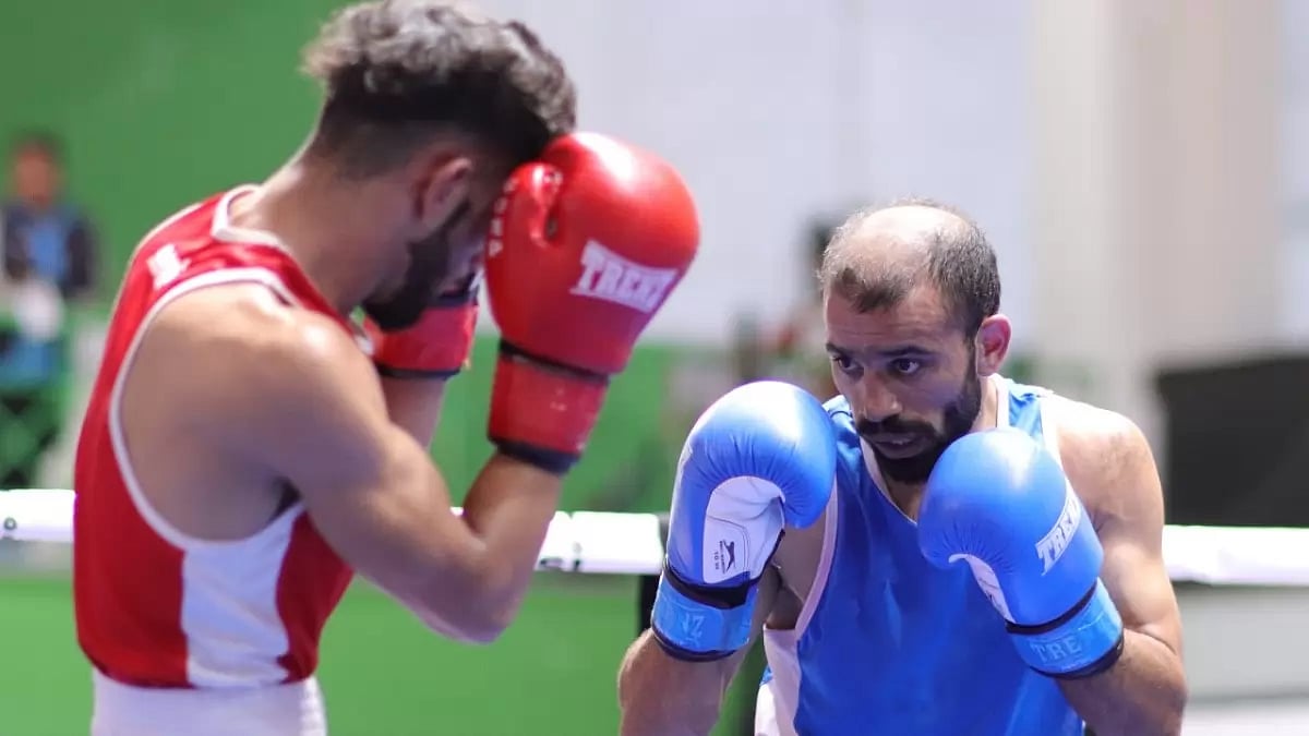 Amit Panghal (R) in action against Mohammad Aarif during Elite Men's National Boxing Championships