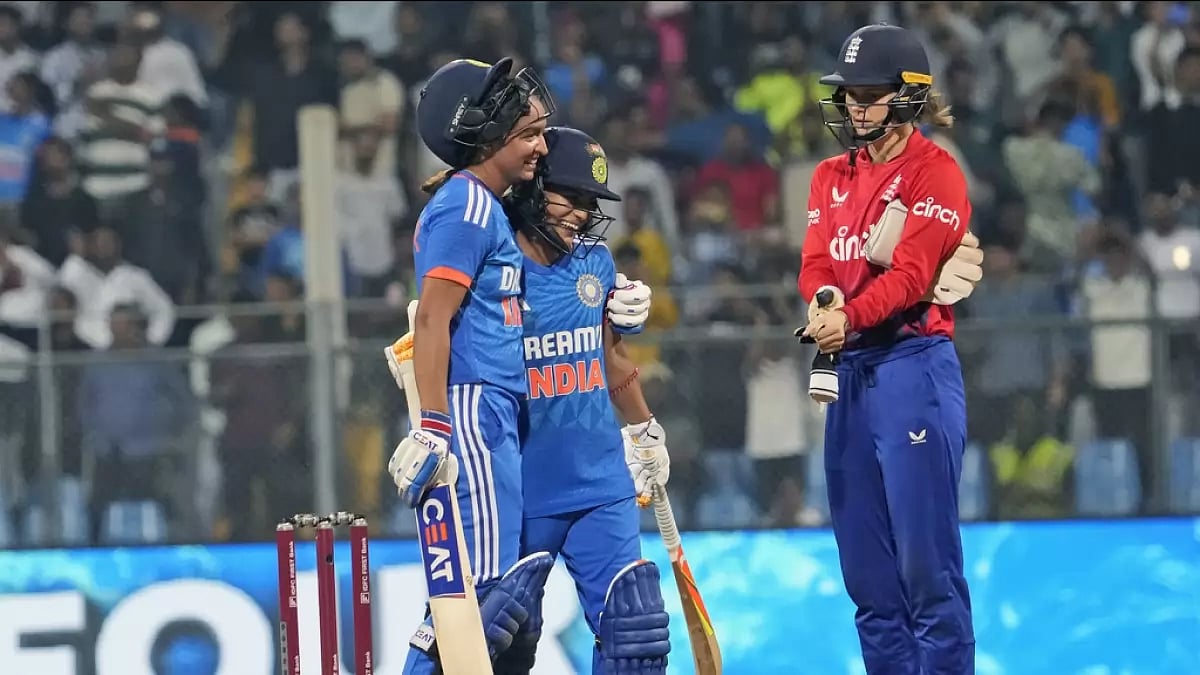 Captain Harmanpreet Kaur (L) with Amanjot Kaur celebrating after winning the match by 5 wickets