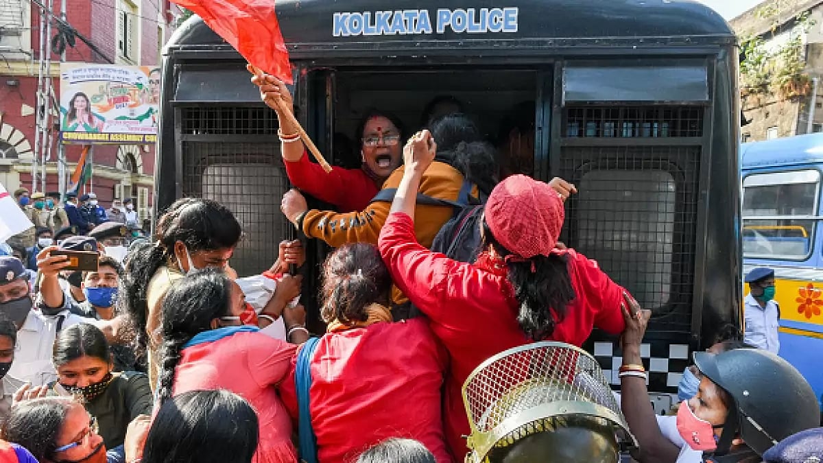 Female supporters of All India Democratic Woman Alliance clash with police during protest in Kolkata - null