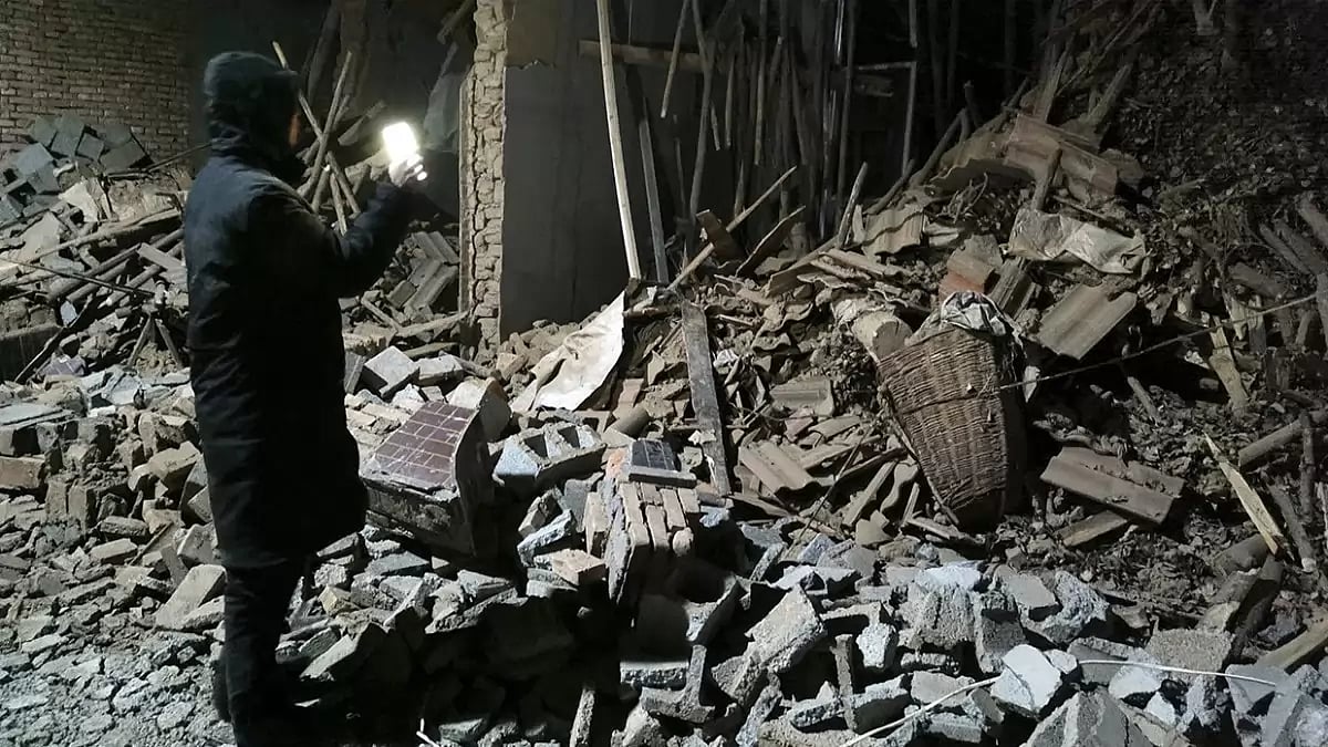 Debris from a wall brought down after the earthquake in northwest China's Gansu 