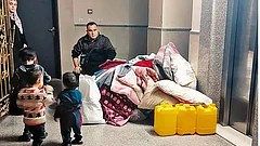 In Transit: Zak and his family during his journey from north of Gaza to the southern part
