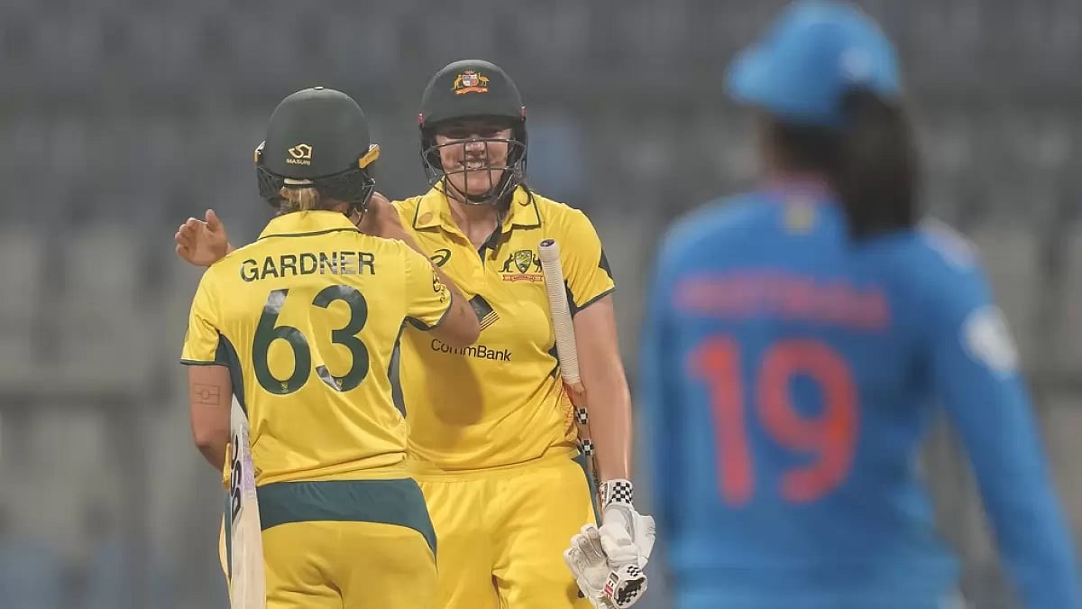 Australia's Tahlia McGrath, centre, and Ashleigh Gardner celebrate their win in the IND-W vs AUS-W ODI in Mumbai on Thursday, December 28, 2023.
