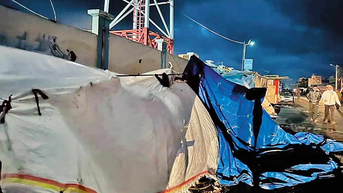 Cramped Spaces: The family is living in a shelter which is housing 30,000 people