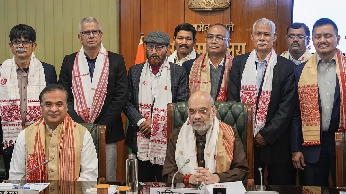 Union Home Minister Amit Shah and Assam Chief Minister Himanta Biswa Sarma with members of ULFA