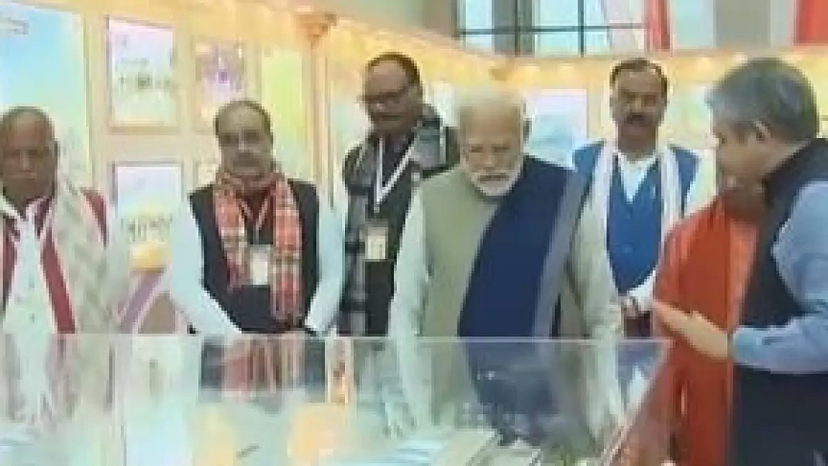 PM Modi inspecting a model of the redeveloped Ayodhya railway junction