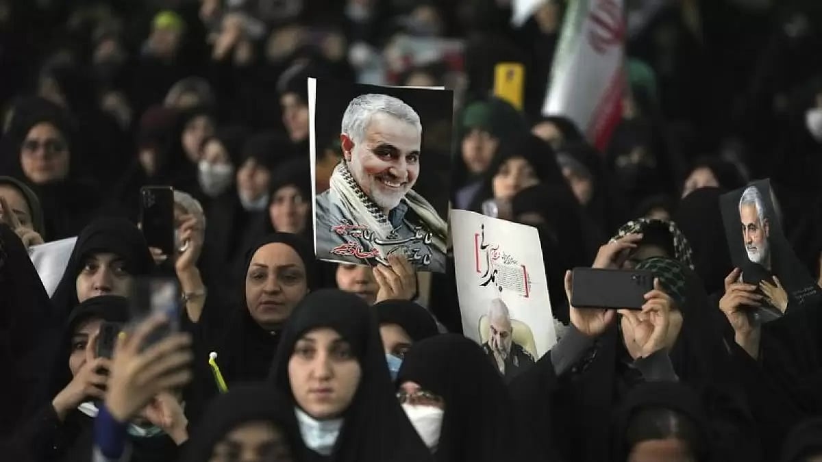 Mourners attend a ceremony marking anniversary of the death of the late Gen. Qassem Soleimani