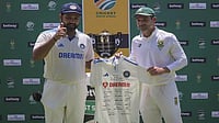 India Vs South Africa, Test Series Review: Rohit Sharma & Co's Highs And Lows From Drawn Red-Ball Leg Rohit Sharma, left, presents Dean Elgar of South Africa, right, with a signed shirt from the Indian team as a retirement gift.