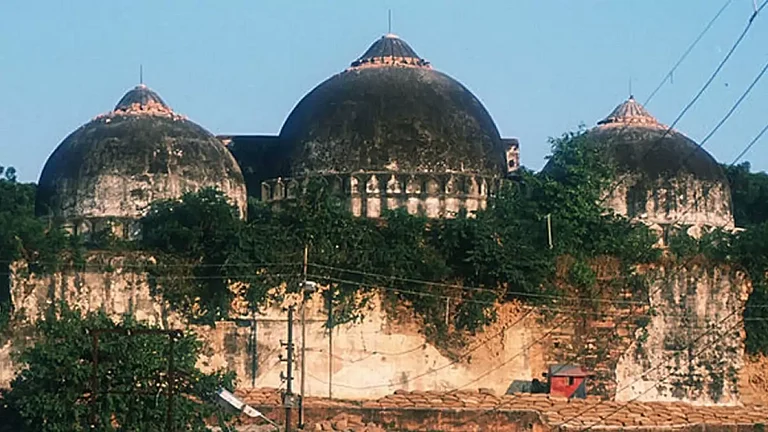 Members of a border security force guard a mosque from attack by militant Hindus October 29, 1990 - null