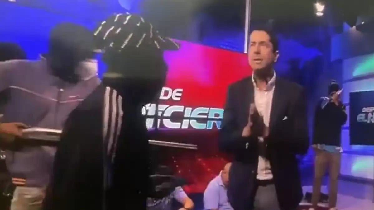 Masked men broke onto the set of a public television channel in Ecuador