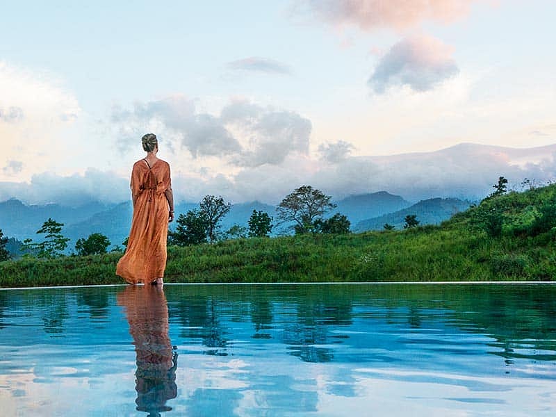 Deposit Photos : A woman stands within the premises of Santani Wellness, Kandy, Sri Lanka