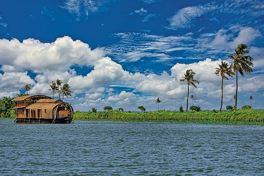Shutterstock : A houseboat in Alappuzha backwaters reflects Tharoor’s evolving sense of home