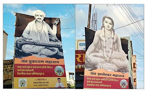 कर्जत : शहरामध्ये यात्रेनिमित्त लावण्यात आलेले संतांचे फलक.