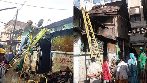 घोटी : आग आटोक्यात आणण्यासाठी प्रयत्न करताना महिंद्रा कंपनीचे सुरक्षा कर्मचारी. (छाया : राहुल सुराणा)