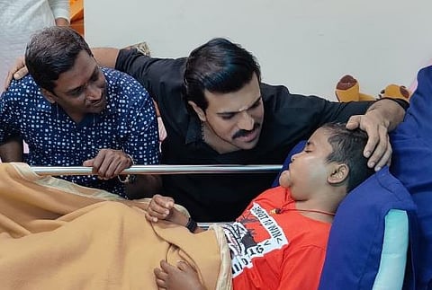  Ram Charan with cancer survival boy