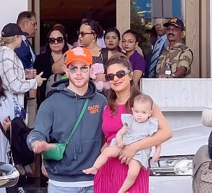 priynka chopra with nick and daughter 