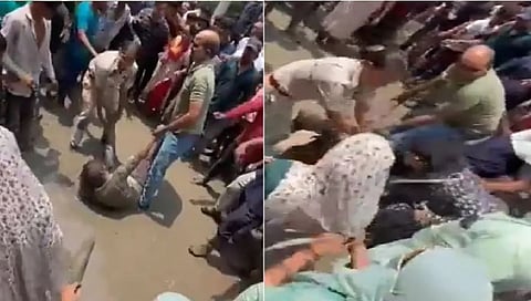 महिला पाेलिसाने जमावाच्‍या तावडीतून भाजप समर्थक मुस्‍लीम महिलेची सुटका केली.   