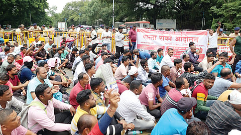 Students protesting in front of the Collector's office demanding that overage candidates should be given a chance to appear in the police recruitment test.