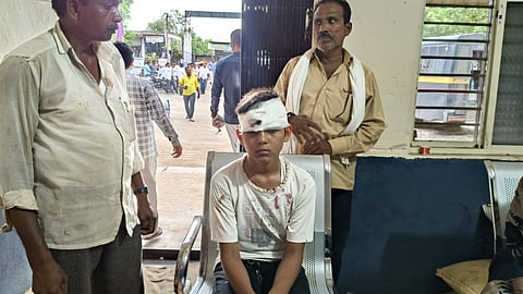The boy is injured here in Dindrud