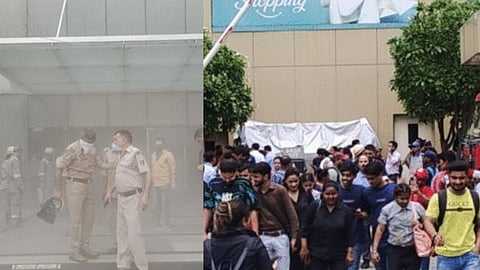 noida logix mall caught fire fire brigade ambulance cloth showroom