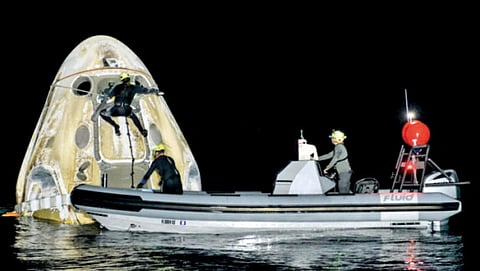 astronauts return Earth