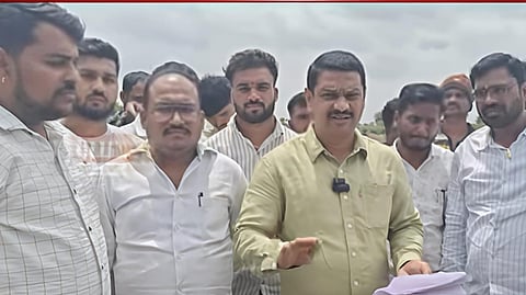 BJP Workers stop road work 