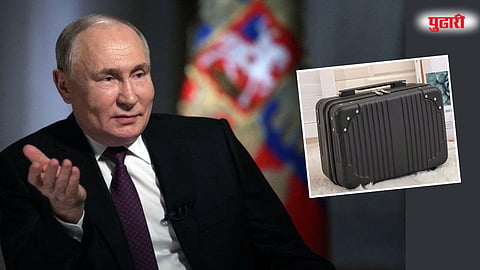 Putin poop suitcase 