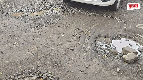 Spine Road Potholes
