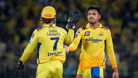 Maheesh Theekshana celebrates with teammate MS Dhoni 
