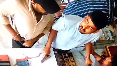 Accused with the gun CCTV footage