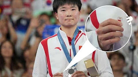 HE BINGJIAO 
