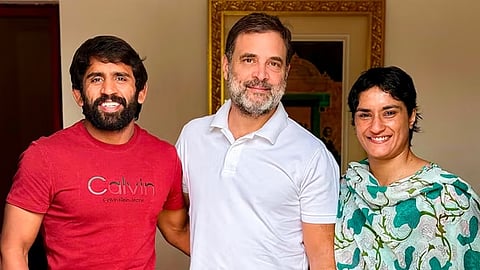 ராகுலுடன் பஜ்ரங் புன்யா, வினேஷ் போகத்