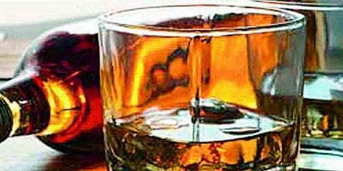 கள்ளச்சாராயம் அருந்தி 13 பேர் பலி - 13 அதிகாரிகள் சஸ்பெண்ட் 