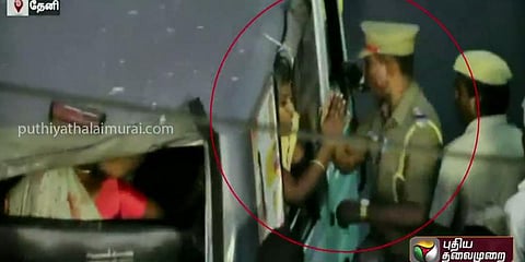 பெண்ணை கன்னத்தில் அறைந்த காவல் அதிகாரி