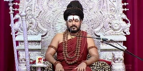 குழந்தை கடத்தல் புகாரும்... நித்தியானந்தா பதிலும்..