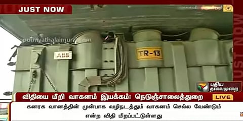 மதுரவாயல் பாலத்தின் அடியில் சிக்கிய கனரக வாகனம்: தீப்பற்றி எரிந்ததால் பரபரப்பு