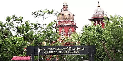 போலி வழக்கு தொடரப்பட்டதால் ரூ.50 ஆயிரம் அபராதம் விதித்த சென்னை உயர்நீதிமன்றம்