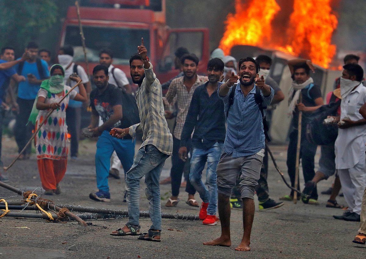 رام رحیم کو مجرم قرار دئے جانے کے بعد تشدد میں 38 لوگ مارے گئے/Getty Images