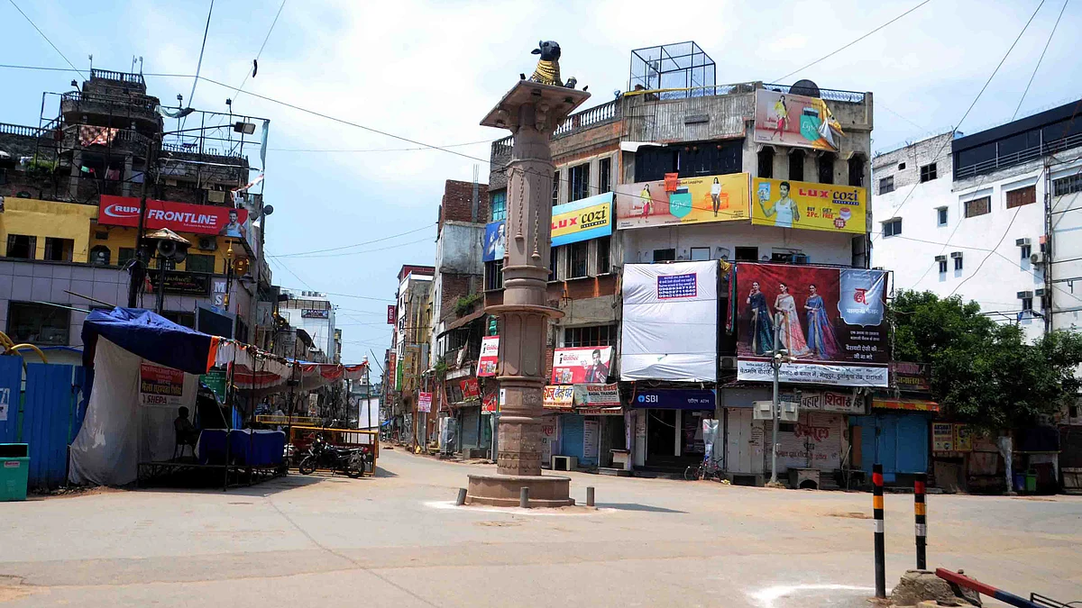 Deserted looks Varanasi market and road during lockdown announced by the State, in Varanasi